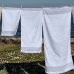 Hvidt laekkert håndklæde med frynser fra finehome